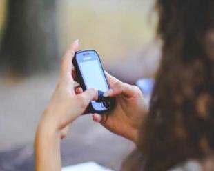 Person looking at Cell Phone