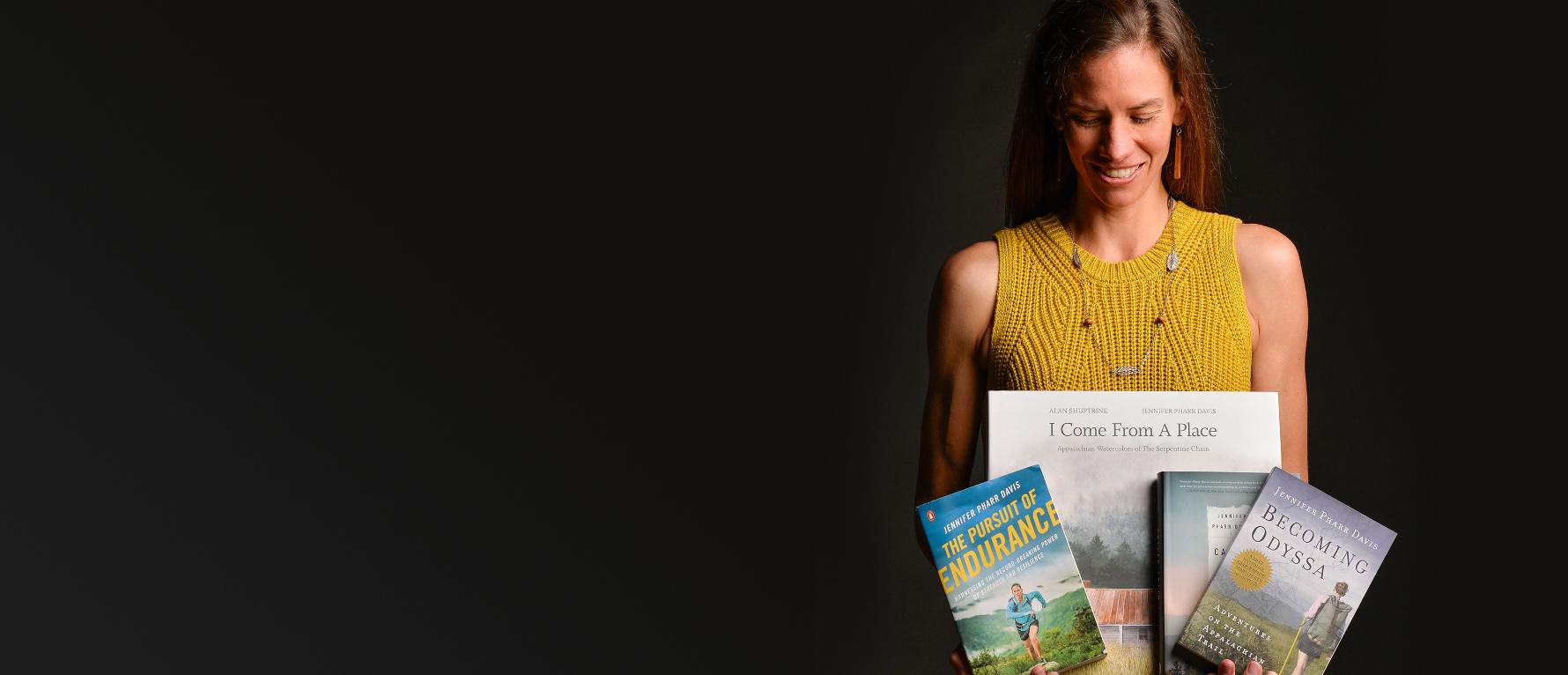 Jennifer Pharr Davis holding books
